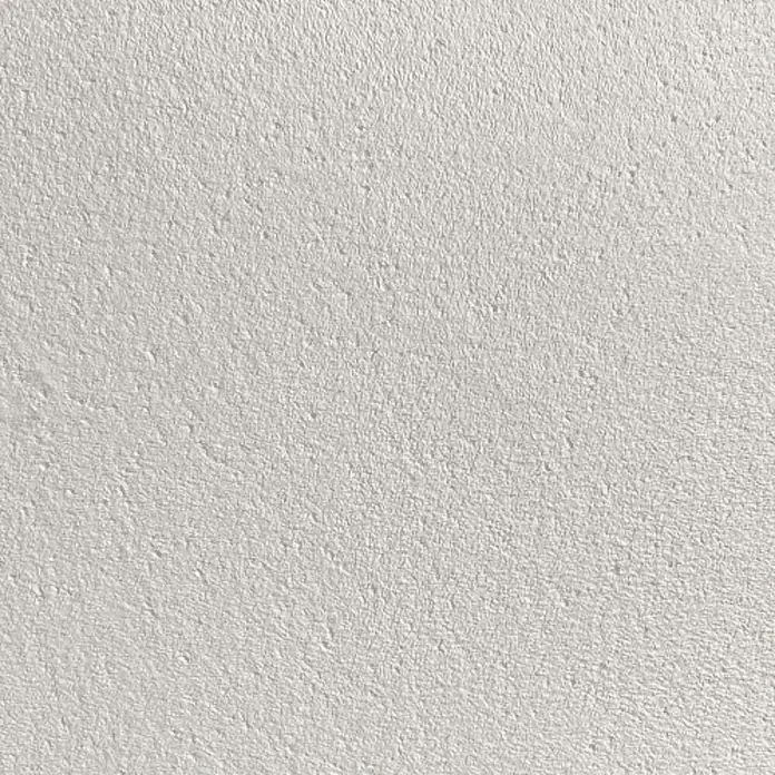 Floxxan Baumwollputz Colorado 158 - Putz Tapete Flüssigtapete Hellbeige fein - Hellbeige fein, 1 kg, Lösemittelfrei - Detailaufnahme einer weißen Wand mit grober Struktur. Die Oberfläche wirkt rau und uneben.