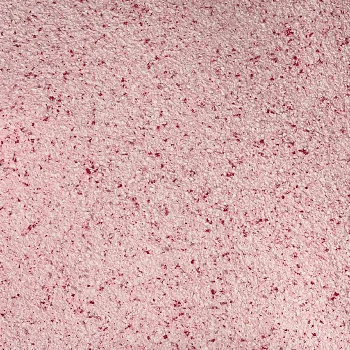 Floxxan Baumwollputz Montana 516 Cellulose - Putz Tapete Flüssigtapete Rot - Flüssigtapete, 1 kg, Lösemittelfrei - Nahaufnahme einer rosa Texturtapete mit roten Sprenkeln, ideal für Wanddekorationen mit einem Hauch von Farbe und Struktur.