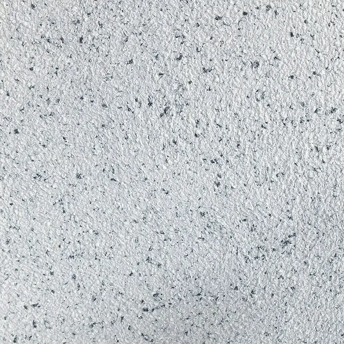 Floxxan Baumwollputz Montana 503 Cellulose - Putz Tapete Flüssigtapete Anthrazit - Anthrazit, 1 kg, Lösemittelfrei - Nahaufnahme einer gesprenkelten, grauen Wandbeschichtung. Die unregelmäßige Textur sorgt für einen interessanten Hintergrund.