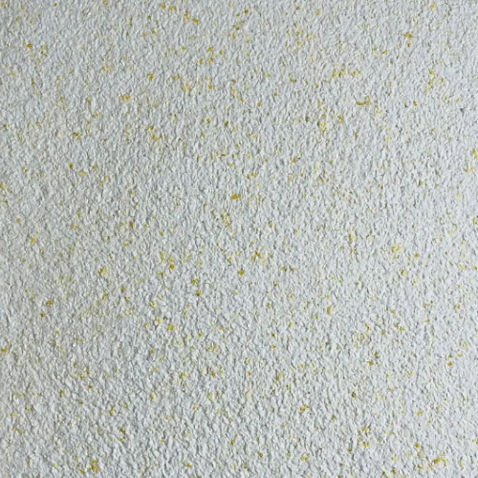 Floxxan Baumwollputz Montana 514 Cellulose - Putz Tapete Flüssigtapete Yellow - Yellow, 1 kg, Lösemittelfrei - Nahaufnahme einer Texturtapete mit gelben Sprenkeln. Die Oberfläche ist rau und uneben.