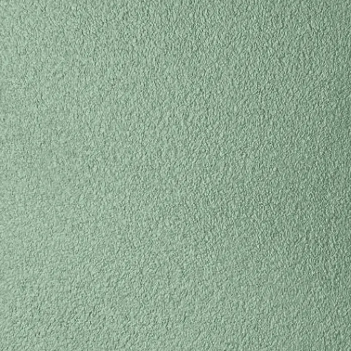 Floxxan Baumwollputz Colorado 160 - Putz Tapete Flüssigtapete Salbei - Salbei, 1 kg, Lösemittelfrei - Nahaufnahme einer hellgrünen Wand mit grober Textur, ideal als Hintergrund.