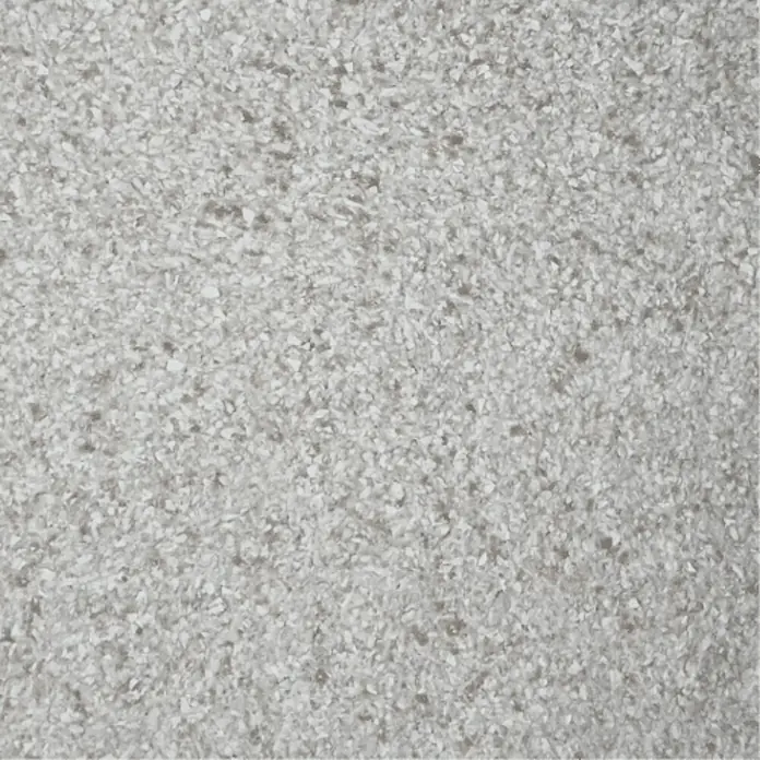 Floxxan Baumwollputz Montana 507 Cellulose - Putz Tapete Flüssigtapete Sand - Sand, 1 kg, Lösemittelfrei - Nahaufnahme einer grau gesprenkelten Arbeitsfläche, ideal für moderne Küchen- oder Badezimmerdesigns mit robuster, langlebiger Textur.
