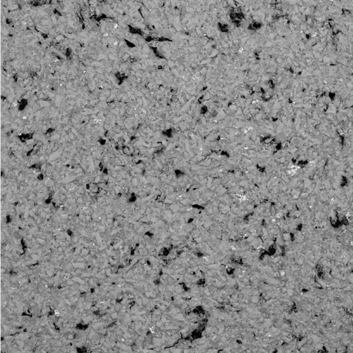 Floxxan Baumwollputz California 201 - Putz Tapete Flüssigtapete Anthrazit m. Mica Natur - Anthrazit, 1 kg, Lösemittelfrei - Grauer Steinzeug-Hintergrund mit dunklen Sprenkeln und subtilen Texturen, ideal für minimalistische Designs und Produktpräsentationen.