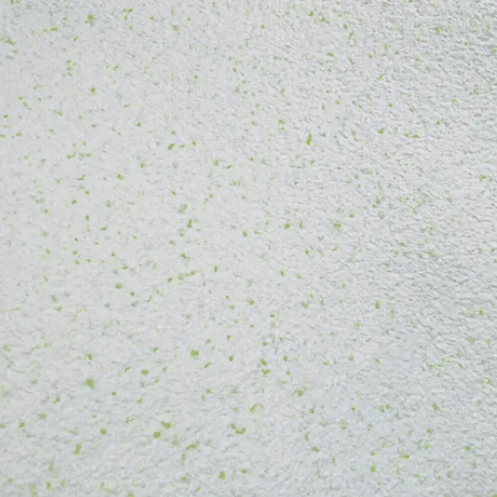 Floxxan Baumwollputz Montana 515 Cellulose - Putz Tapete Flüssigtapete Lemon Green - Lemon Green, 1 kg, Lösemittelfrei - Nahaufnahme einer gesprenkelten, hellgrünen Oberfläche, ideal als Hintergrund für Texturen oder subtile Designs.