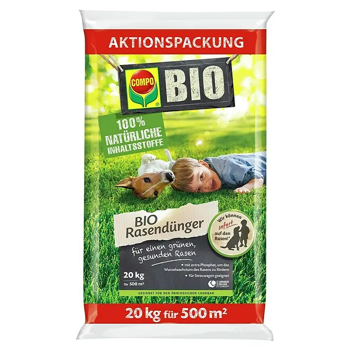 Compo Bio-Rasendünger Aktion - 20 kg, Max. Anwendungsfläche: 500 m² - Abbildung einer COMPO BIO Rasendünger-Packung mit einem Kind und einem Hund auf dem Rasen.