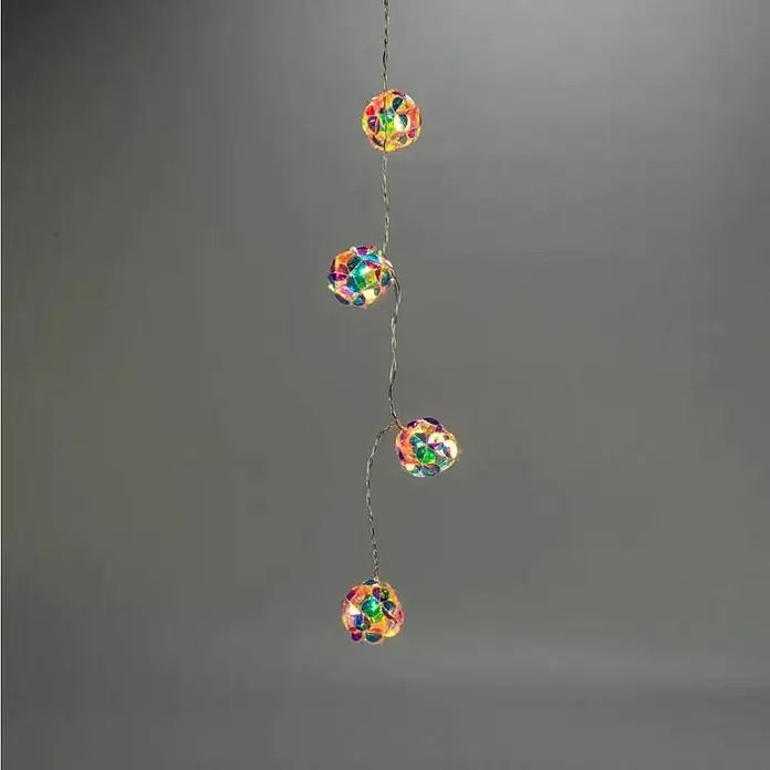 Konstsmide LED-Lichterkette - Innen, Lichtfarbe: Warmweiß, Anzahl Leuchtmittel: 10 Stk., Batteriebetrieben, LED - Farbfrohe Lichterkette mit runden, schimmernden Lampen, die ein warmes, einladendes Ambiente schafft.\n
