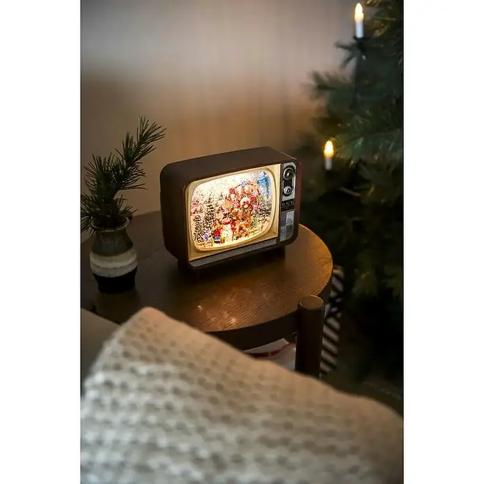 Konstsmide LED-Weihnachtsdekofigur - 21 x 12,3 x 17,6 cm, Batteriebetrieben, LED - Weihnachtliche Tischdeko mit TV-Schneekugel. Die Schneekugel in TV-Form zeigt eine winterliche Szene mit Weihnachtsmann und Tannenbäumen.