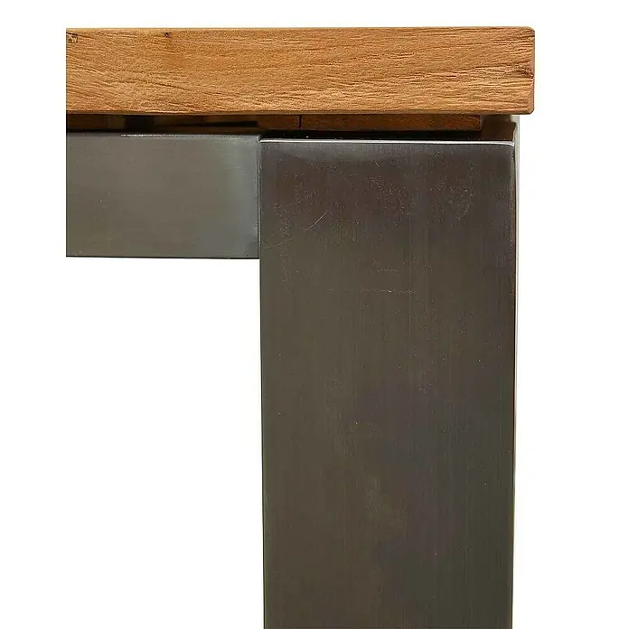 Kai Wiechmann Gartentisch - L x B x H: 220 x 100 x 76,5 cm, Teak, Rechteckig, Naturbelassen - Nahaufnahme einer Tischkante mit einer Holzplatte und einem robusten Metallfuß, der ein modernes und industrielles Design ausstrahlt.