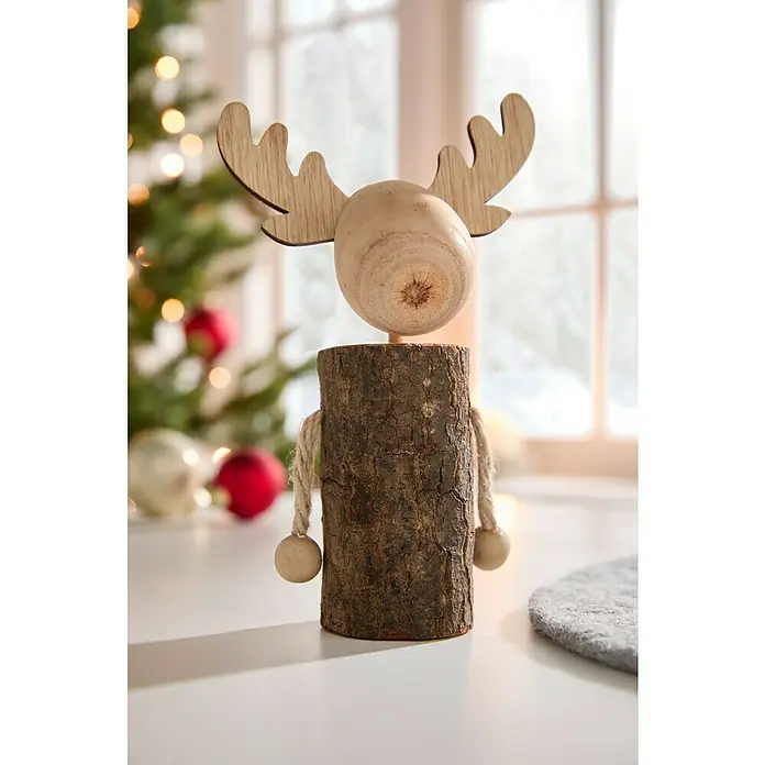 Dekofigur Weihnachtsrentier - L x B x H: 12 x 8 x 20 cm, Holz - Ein rustikaler hölzerner Elch als Weihnachtsdekoration. Der Elch hat Geweihe und Kugel-Arme.