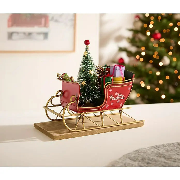 Dekofigur Weihnachtsschlitten - L x B x H: 22 x 10,5 x 18 cm, Metall - Dekorativer Weihnachtsschlitten mit Baum, Geschenken und Aufschrift "Merry Christmas", ideal für festliche Dekorationen.