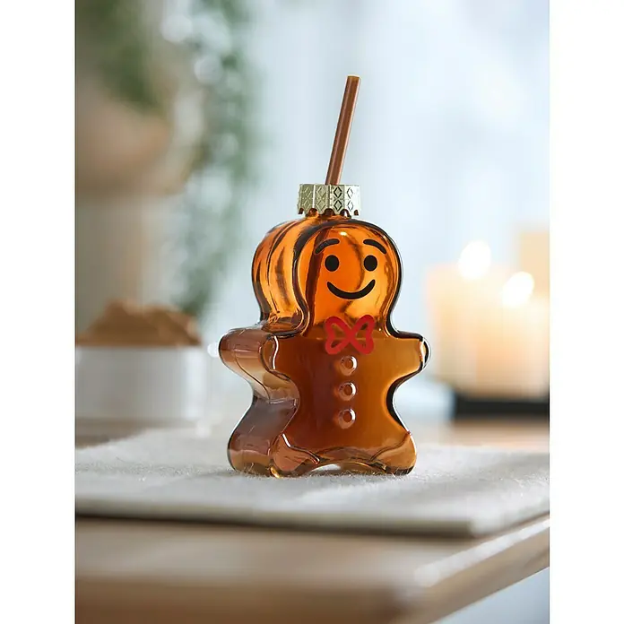 Boltze Trinkglas Lebkuchenmännchen - Braun, L x B x H: 4,7 x 10 x 14,5 cm, Lebkuchen - Gingerbread-Mann-Getränkespender. Der Getränkespender in Lebkuchenform mit einem lächelnden Gesicht ist die perfekte festliche Dekoration für Weihnachten.