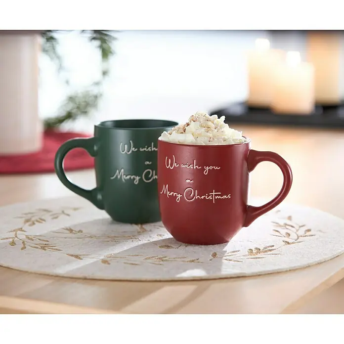 Boltze Tasse Merry Christmas - Rot, L x B x H: 8,3 x 8,3 x 9,5 cm, 300 ml - Zwei festliche Tassen mit dem Aufdruck "We wish you a Merry Christmas", eine gefüllt mit Schlagsahne.