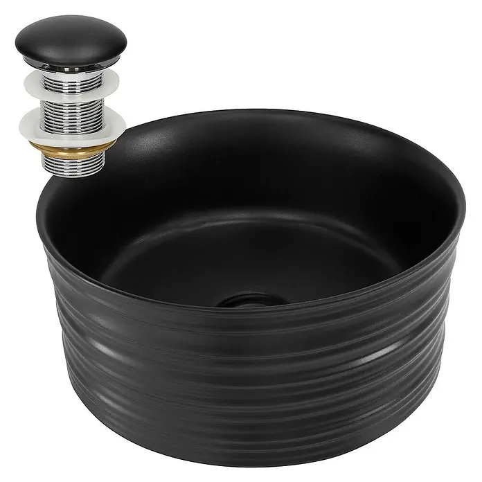 LuxeBath Aufsatzwaschbecken Rund Ø41x18 cm Schwarz Ablaufgarnitur Schwarz - Ohne Spezialglasur, Schwarz - Elegantes, schwarzes Waschbecken mit Ablaufgarnitur. Das Waschbecken besticht durch sein modernes Design und die geriffelte Oberfläche.