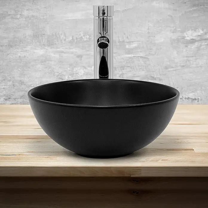 LuxeBath Aufsatzwaschbecken Aufsatzwaschtisch Spülbecken inkl. Ablaufgarnitur ohne Überlauf Becken - Ohne Spezialglasur, Schwarz - Elegantes schwarzes Aufsatzwaschbecken mit schlanker Armatur für ein modernes Badezimmerdesign.