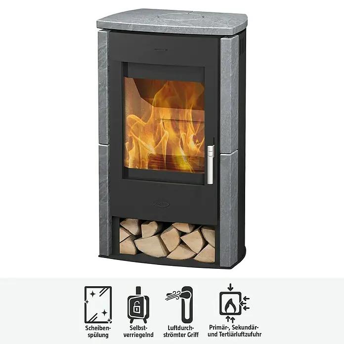 Fireplace Kaminofen Brasil - 6 kW, Raumheizvermögen: 108 m³, Material Verkleidung: Speckstein, Schwarz - Bild eines Kaminofens mit Holzscheiten. Der Ofen hat eine Glastür, durch die man das Feuer sehen kann.