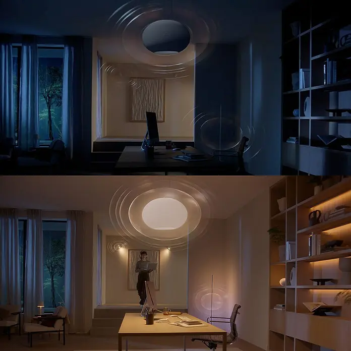 Philips Hue Steuerzentrale Bridge Pro - Schwarz, L x B x H: 9,2 x 9,2 x 2,6 cm - Intelligente Beleuchtung im Vergleich: Oben dunkle, unten helle Arbeitsumgebung. Fokus auf die anpassbare Lichtstimmung durch LED-Lampen.