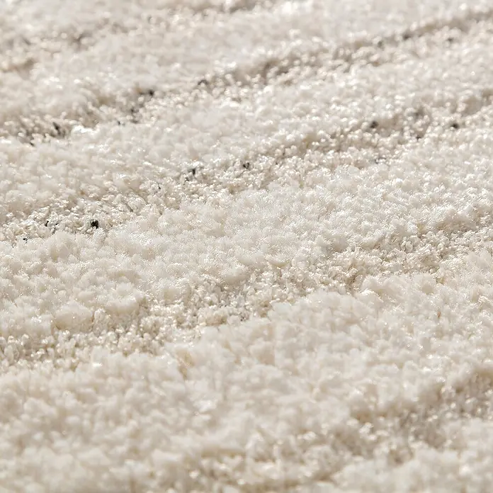Dekoria Flachgewebeteppich - creme, beige - Nahaufnahme eines beigen Teppichs mit strukturiertem Muster.