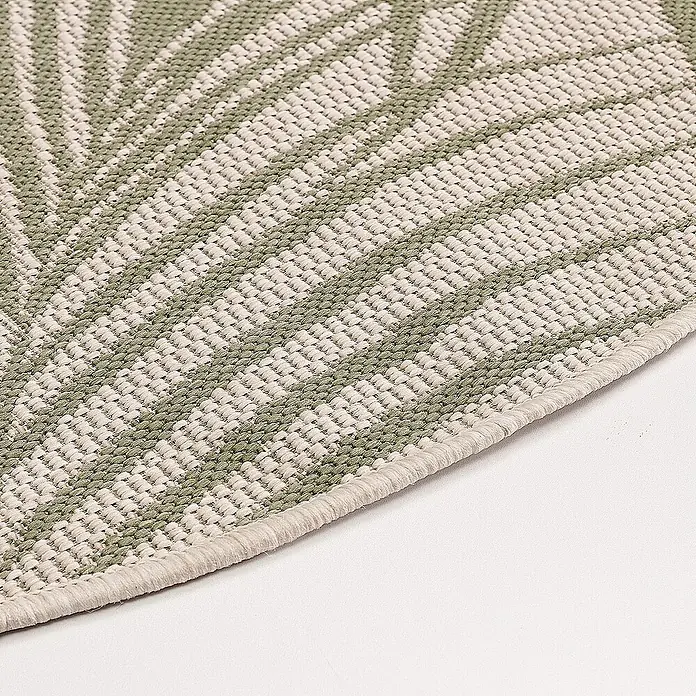 Dekoria Flachgewebeteppich - grün, beige - Detailaufnahme eines runden Teppichs mit dezentem, grünem Palmenmuster und heller Umrandung, ideal für stilvolle Bodenakzente.