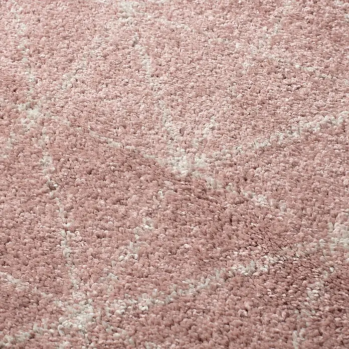 Dekoria Flachgewebeteppich - pink, 170 x 120 cm - Nahaufnahme eines zartrosa, flauschigen Teppichs, der eine weiche und einladende Textur für jeden Raum bietet.