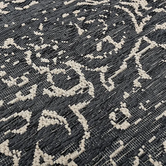 Dekoria Flachgewebeteppich - schwarz, 290 x 200 cm - Nahaufnahme eines strukturierten Teppichs in Grau und Beige mit einem abstrakten Muster, ideal für moderne Wohnräume.
