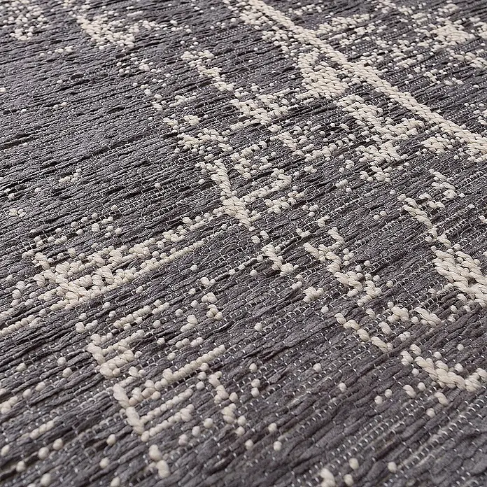 Dekoria Flachgewebeteppich - grau, 290 x 200 cm - Nahaufnahme eines gewebten Teppichs mit einem abstrakten Muster in Grau- und Cremetönen.