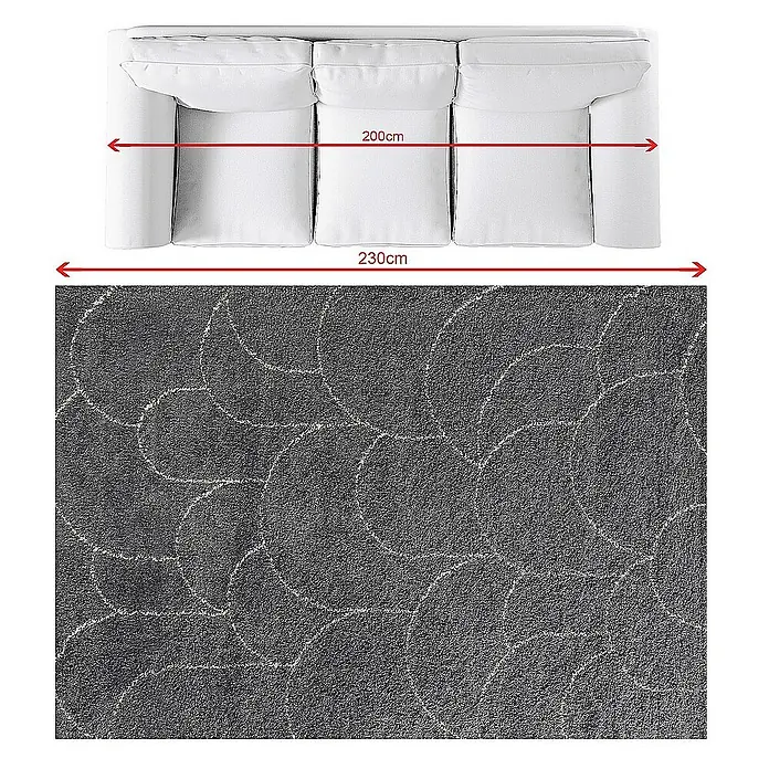 Dekoria Flachgewebeteppich - grau, 230 x 160 cm - Abbildung eines weißen Sofas mit den Maßen 200 cm und 230 cm, platziert auf einem grauen Teppich mit Kreismuster.