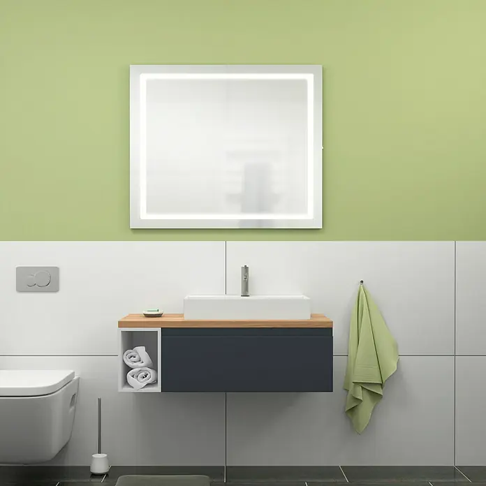 Camargue Espacio Badmöbel-Set i114 - 100 cm, Gama anthrazit matt - Das Bild zeigt ein modernes Badezimmer mit einem beleuchteten Spiegel, einem Waschtisch mit Holzplatte und einem hängenden Unterschrank in dunklem Blau.