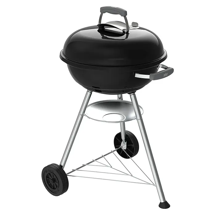Weber Compact Kugelgrill Kettle - Durchmesser Grillfläche: 47 cm, Schwarz - Abbildung eines Weber Holzkohlegrills, ideal für sommerliche Grillpartys im Garten.