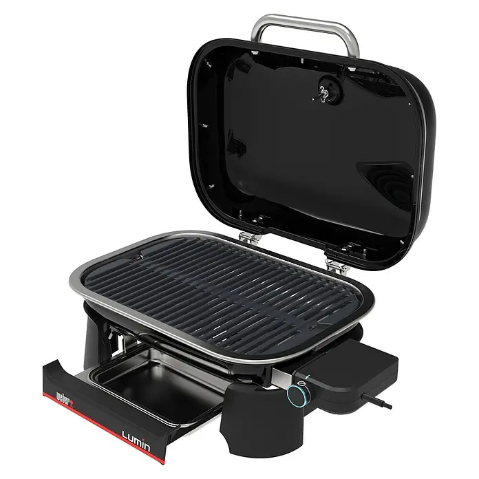 Weber Elektrogrill Lumin Compact - Grillfläche (B x T): 43 x 28 cm, 2,2 kW - Hier ist der Weber Lumin Elektrogrill mit geöffnetem Deckel, ein kompakter Grill für Balkon und Terrasse, ideal für köstliche Mahlzeiten im Freien.