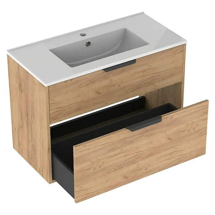 Outlets Bath Waschbeckenunterschrank Triana - Craft Oak, 80 x 38 x 54 cm, Farbe Griff: Schwarz - Ein moderner Waschtischunterschrank mit einer Schublade in Holzoptik und einem weißen Waschbecken. Das Möbelstück bietet Stauraum für das Badezimmer.