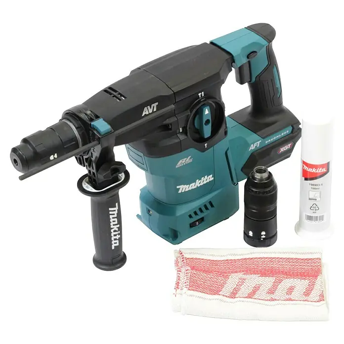 Makita XGT 40V max. Akku-Kombihammer HR009GZ - 40 V, Ohne Akku, 3,9 J - Eine Makita Kombihammer-Bohrmaschine, ein Bohrfutter, eine Tube Schmiermittel und ein Tuch liegen auf einem Tisch.