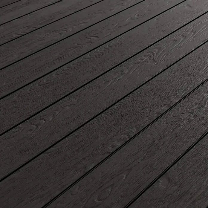 Kovalex WPC-Terrassendiele Massiv mit Struktur nach Maß - Graubraun, 310 x 14,5 x 2 cm - Nahaufnahme einer dunklen Holzterrasse mit markanter Maserung, ideal für Außenbereiche und Gartenmöbel.