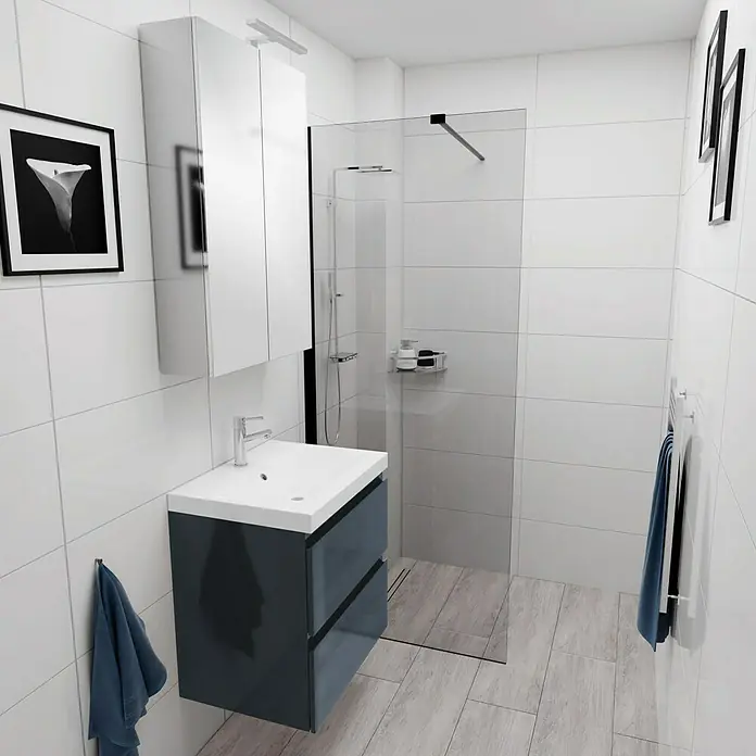 Camargue Espacio Badmöbel-Set E34 - 60 cm, Gama anthrazit glänzend - Helles Badezimmer mit einem modernen Waschtisch in Dunkelblau und einem weißen Aufsatzwaschbecken, ergänzt durch eine Duschkabine mit klaren Glaswänden.