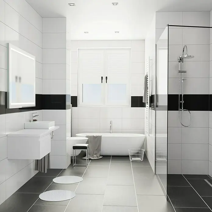 Camargue Espacio Badmöbel-Set K22 - 120 cm, Gama weiß matt - Badezimmer mit weißen Fliesen, schwarzem Akzentband und moderner Ausstattung wie Waschtisch, Badewanne und Dusche.