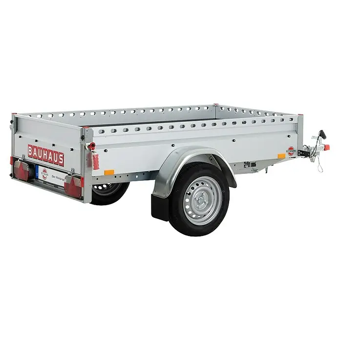 Stema Anhänger BH-R 750 Kippdeichsel - Nutzlast: 591 kg, Einachser, Kasteninnenmaß: (L x B x H): 201 x 108 x 100 cm, Ungebremst - Ein silberner Anhänger von BAUHAUS mit robusten Reifen und auffälligem Logo. Ideal für Transportaufgaben, stabil und zuverlässig.