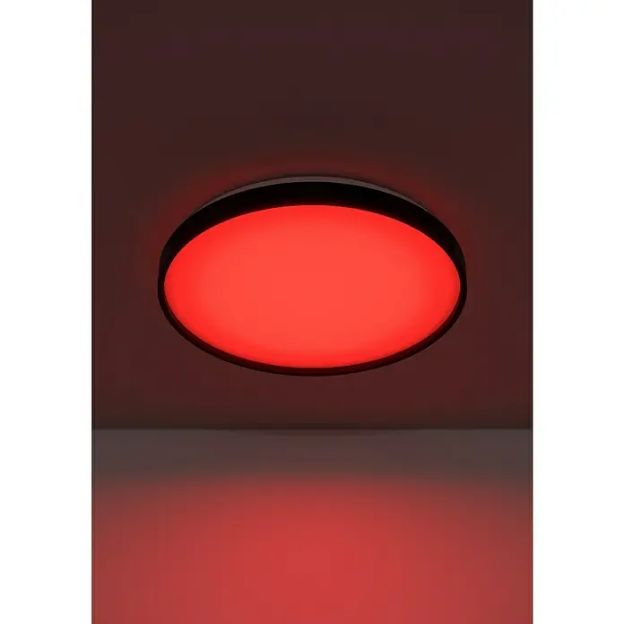 Eglo LED-Deckenleuchte rund Mozoncillo-Z - 34 W, Ø x H: 48,4 x 6,5 cm, Schwarz, Weiß, RGBW - Eine rote LED-Deckenleuchte mit einer schmalen schwarzen Umrandung ist an einer Decke montiert und erzeugt ein warmes, rotes Licht im Raum.