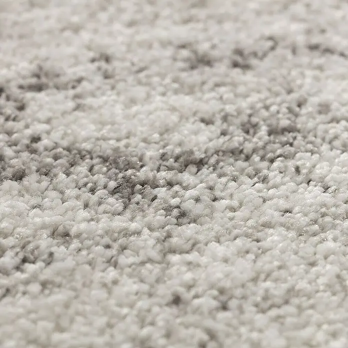 Dekoria Flachgewebeteppich - grau, creme, 170 x 120 cm - Detailaufnahme eines Teppichs mit abstraktem Muster in Grau- und Weißtönen. Weiche Textur für Komfort und Stil im Wohnbereich.