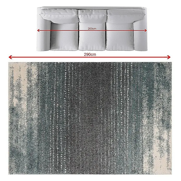 Dekoria Flachgewebeteppich - grau, türkis, 290 x 200 cm - Graues Sofa mit den Maßen 200 cm auf einem abstrakten Teppich mit den Maßen 290 cm für die perfekte Raumgestaltung.