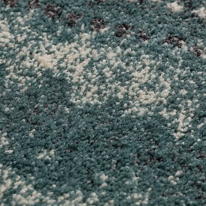Dekoria Flachgewebeteppich - grau, türkis, 290 x 200 cm - Nahaufnahme eines Teppichs mit einem Muster aus Blau, Grau und Weiß, das eine interessante Textur erzeugt.