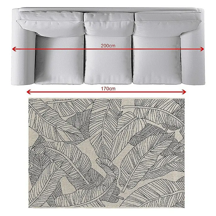 Dekoria Flachgewebeteppich - creme, beige, 170 x 120 cm - Wohnzimmeransicht mit einem grauen Sofa und einem Teppich mit Bananenblattmuster.