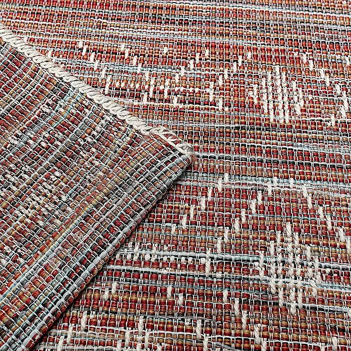 Dekoria Flachgewebeteppich - rot, bunt, 230 x 155 cm - Nahaufnahme eines gewebten Teppichs mit detaillierten Texturen und Mustern in Rot- und Weißtönen, der die Handwerkskunst hervorhebt.