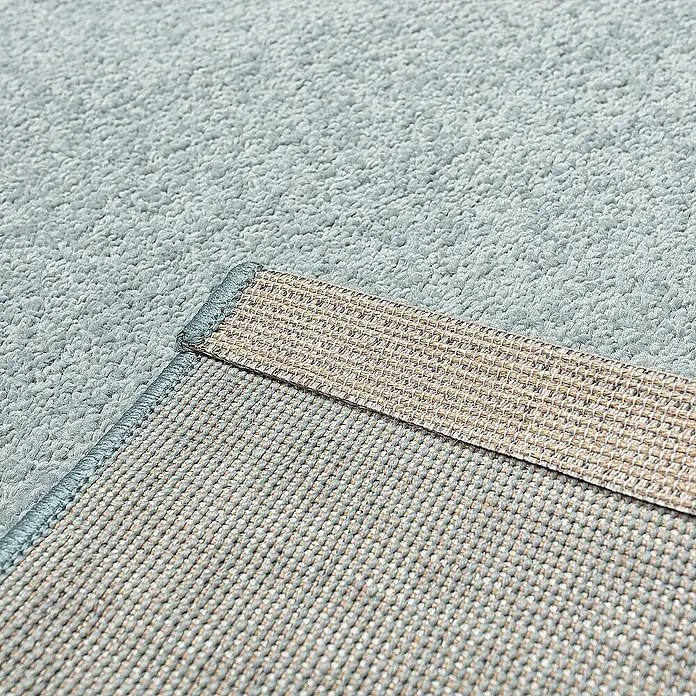 Dekoria Flachgewebeteppich - blau, 170 x 120 cm - Nahaufnahme eines hellblauen Teppichs, der die Textur und die Details des Materials hervorhebt.