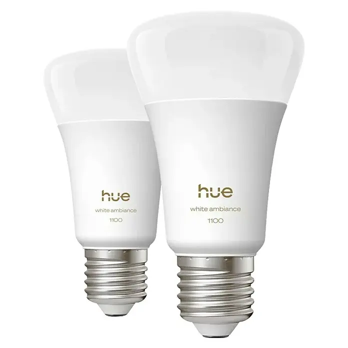Philips Hue Smart-LED-Lampen Set White 1100 matter - E27, 8,1 W, 1.100 lm, 2 Stk. - Zwei Hue White Ambiance 1100 Glühbirnen im Vordergrund, die intelligentes Licht mit anpassbarer Helligkeit und Farbtemperatur bieten.
