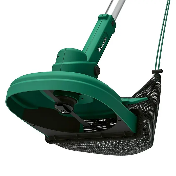 Ruwi Akku-Rasentrimmer inkl. Auffangbehälter - 12 V, Li-Ionen, 1 Akku, Schnittbreite Messer: 21 cm - Nahaufnahme eines grünen Ruuvi-Rasentrimmers mit schwarzem Schneidemesser und Schutzvorrichtung.