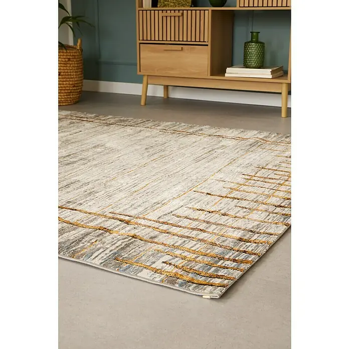 Alfombra de pelo corto Almo - Teja, 190 x 135 cm, 100% Poliéster - Alfombra moderna con un diseño abstracto en tonos grises y dorados, que añade un toque de elegancia a cualquier habitación. Ideal para salones o comedores.