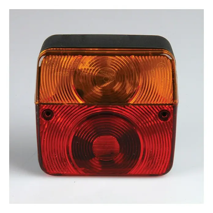 UniTEC Rückleuchte - 2 Kammern - Nahaufnahme einer kombinierten Anhängerleuchte mit Blinker und Bremslicht in Orange und Rot.