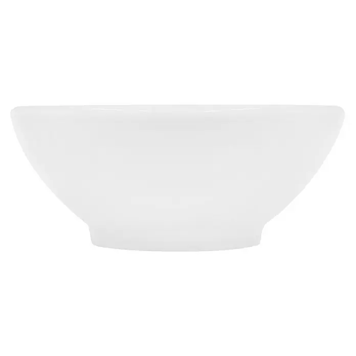 LuxeBath Aufsatzwaschbecken Aufsatzwaschtisch Handwaschbecken inkl. Ablaufgarnitur mit Überlauf - Ohne Spezialglasur, Weiß, Silber - Nahaufnahme einer weißen Keramikschale mit sanften Rundungen, ideal für Müsli oder Suppen. Das minimalistische Design fügt sich nahtlos in jede Tischdekoration ein.