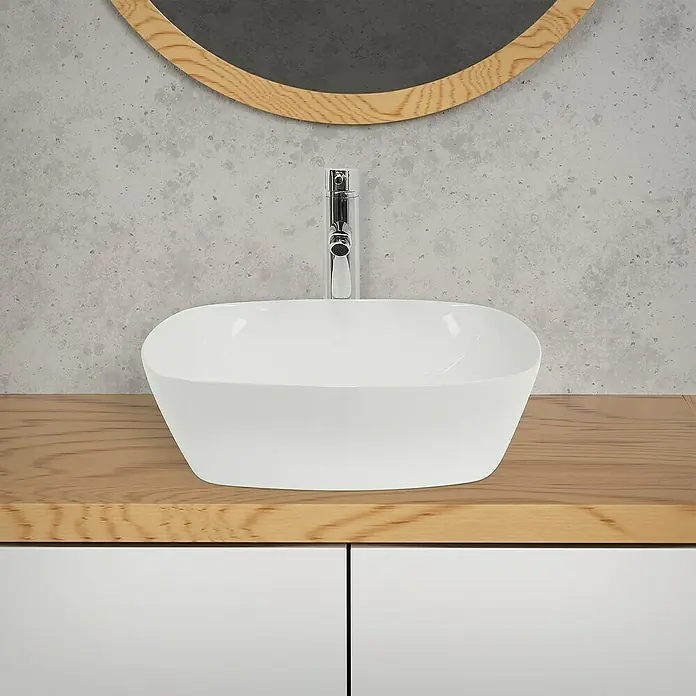 LuxeBath Aufsatzwaschbecken Waschschale Rund Weiß Spülbecken Handwaschbecken Becken - Ohne Spezialglasur, Weiß - Das Bild zeigt ein modernes Badezimmerwaschbecken in Weiß, montiert auf einer hellen Holzplatte mit einem schlichten, eleganten Design.
