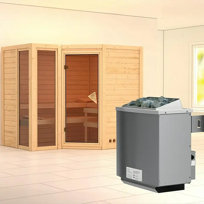 Karibu Massivholzsauna Amara - Mit 9 kW Ofen mit integrierter Steuerung, Ohne Dachkranz, L x B x H: 236 x 184 x 200 cm - Saunaofen mit Steinen im Vordergrund, mit einer Holzkabine und einem Fenster im Hintergrund.