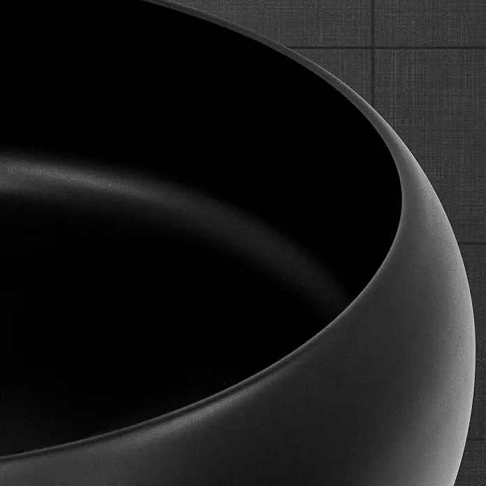 LuxeBath Aufsatzwaschbecken Waschtisch aus Keramik für Badezimmer / Gäste-WC - 45 x 65 cm, Ohne Spezialglasur, Schwarz - Nahaufnahme einer eleganten, schwarzen Schale, die minimalistisches Design und hochwertige Verarbeitung vereint. Ideal für moderne Einrichtungen.